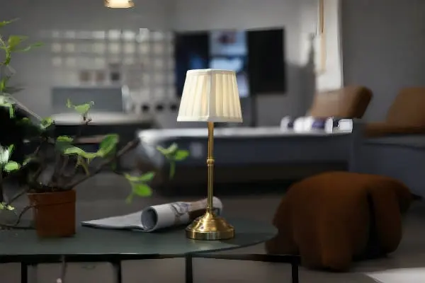 Cordless table lamp used in an indoor lounge