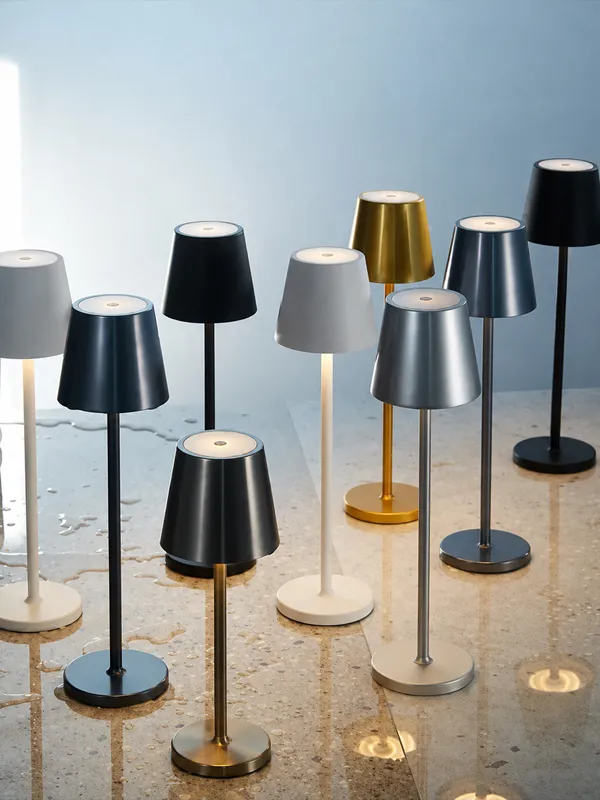 Custom metal hardware used in decorative table and floor lighting