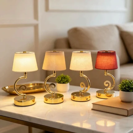 Gold scroll cordless table lamp in four fabric shade colours: cream, beige linen, ivory and burgundy